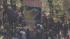 May Day protesters march in downtown Oakland