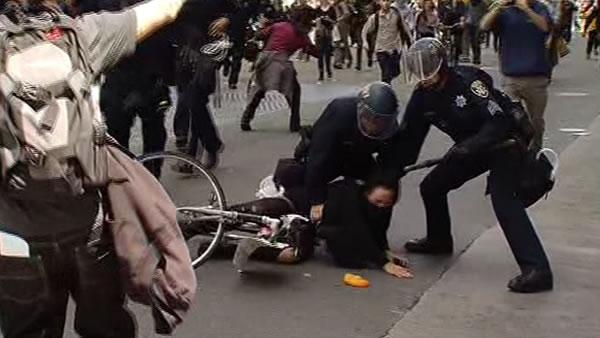 Oakland police officers and protesters clash during a May Day march in downtown Oakland (May 1, 2012/KGO)