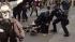 Oakland police officers and protesters clash...