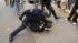 Oakland police officers and protesters clash...