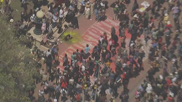 May Day protesters march in downtown Oakland