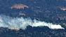 Officials believe fireworks started grass fire