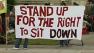 stand up for the right to sit down sign