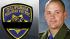 Officer Kenyon Youngstrom and badge