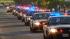 A procession of CHP cars left a funeral chapel...