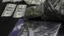 Thousands of dollars and over a pound of pot found in teachers car.