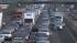 Big-rig carrier drops cars, forcing road...