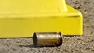 Bullet casing and yellow crime marker