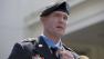 US Army Staff Sgt. Ty M. Carter speaks to the media and his holds Medal of Honor outside the West Wing of the White House in Washington, Monday, Aug. 26, 2013, after President Barack Obama presented it inside.