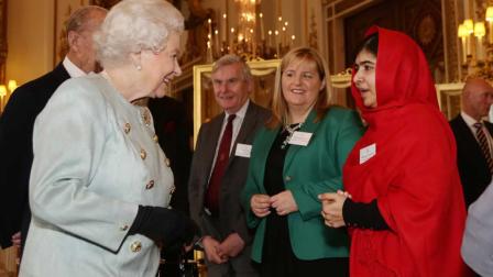 Britains Queen Elizabeth II meets Malala Yousafzai.