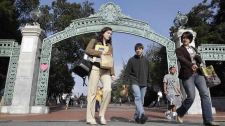 University of California, Berkeley students walk through Sather Gate on the Berkeley, Calif., campus, Wednesday, Dec. 14, 2011. (AP Photo/Paul Sakuma)