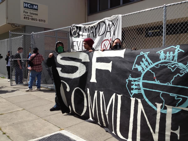 May Day protesters march in downtown Oakland