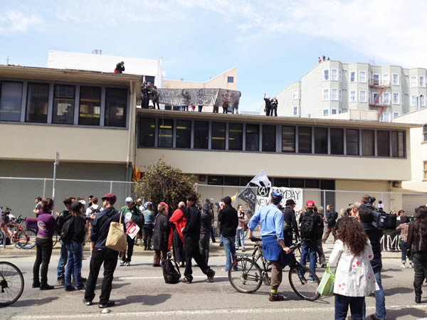 May Day protesters march in downtown Oakland
