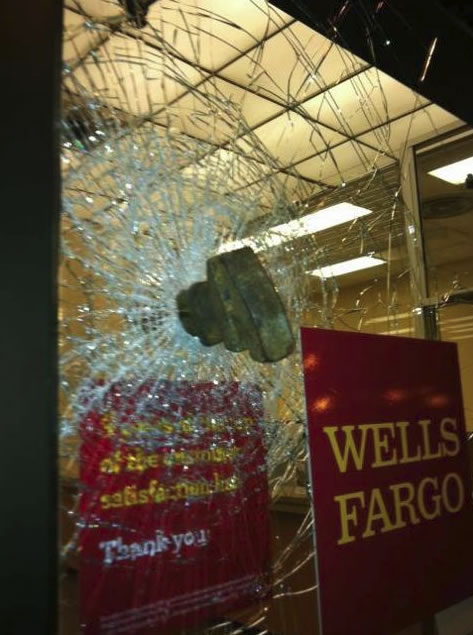 Oakland police officers and protesters clash...