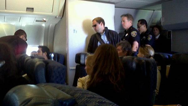 Two people were detained after a security threat prevented a plane from taking off from SFO Thursday.