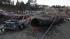 Incomplete pipeline docs may lead to fines... :: A ruptured gas pipe that caused a massive explosion is shown beside a burned car in San Bruno, Calif.