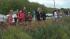 Spectators gather to see yacht return :: Spectators gather to see yacht return
