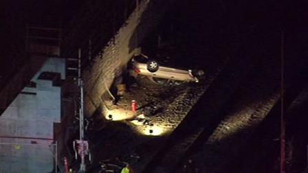 car on Caltrain tracks in San Bruno