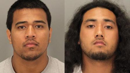 Two East Palo Alto residents were arrested Friday on suspicion of robbing a man at gunpoint near downtown Palo Alto earlier this month.