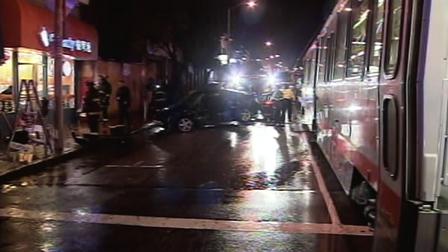 A train hits a car on Taraval Street in the Sunset District.