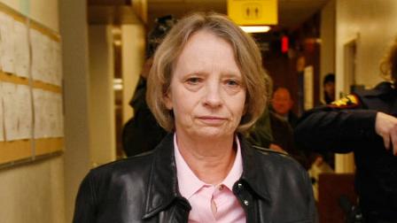 Former longtime San Francisco lab technician Deborah Madden is escorted from her arraignment for drug possession in a South San Francisco.