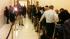 A long line formed with hopeful couples before...