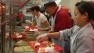 Members of the Asian Culinary Association served lunch and will prepare dinner for 2,500 people at Glide Memorial Church.