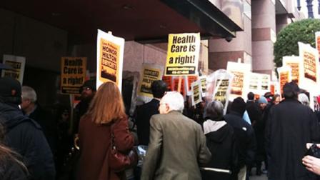 Dozens of law professors marched in support of hotel workers
