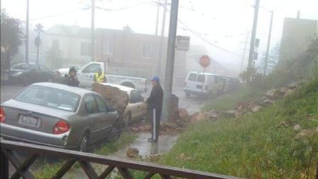 Two boulders fell from a hill and landed on two unoccupied vehicles in San Francisco on Quintara at 12th Avenue.