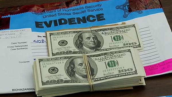 Elderly merchant accused of passing counterfeit bills