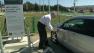 Richard Weisner spends a lot of time doing business inside his Chevy Volt because he has to wait for it to charge.