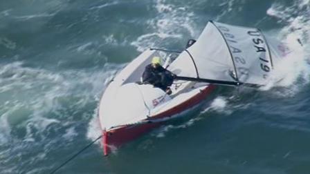 Three people were rescued by the U.S. Coast Guard after the mast broke on their sailboat in San Francisco Bay.