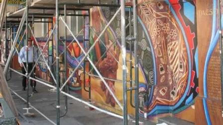 The artists who originally painted the vibrant MaestraPeace mural