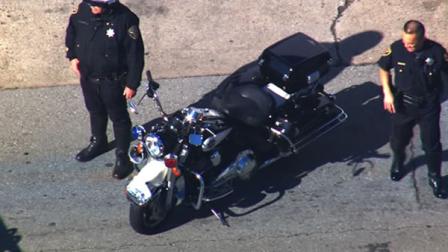 A San Francisco police motorcycle officer was injured in a crash 
in the citys South of Market neighborhood Monday morning.