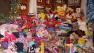 San Francisco firefighters and police officers spent 
Christmas morning distributing new toys to thousands of the citys children.