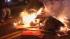 San Francisco officials urge football fans to... :: Debris burns on a San Francisco street