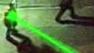 A man in San Franciscos Mission District points a laser at Sky7 HD.
