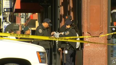 Investigators near King and Third Streets where a cyclist was hit by a cement truck