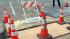 Repair work continues after SF water main break :: Cones around an area affected by a water main break in San Franciscos West Portal neighborhood.