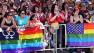 Crowd with rainbow flags at SF Pride Parade