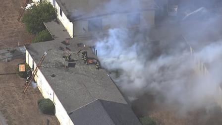 firefighters working Treasure Island fire