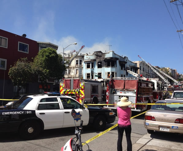 San Francisco firefighters battle a four-alarm...