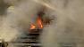 The fire, burning at an abandoned warehouse at 1880 Dobbin Drive,  was reported at about 2:50 p.m.