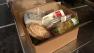 Sacred Heart Community Service began its food box giveaway.