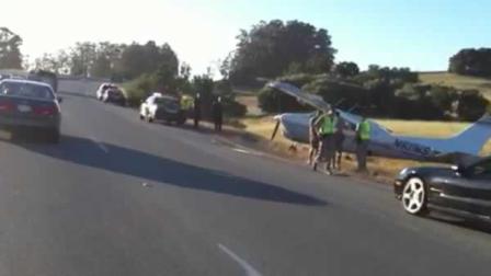 A small plane made an emergency landing on Highway 280 near Woodside Sunday evening. (Photo by Colin John Camarillo / Trainwreck Films 2011)