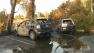 A brush fire along Highway 85 in Los Gatos destroyed three vehicles and a shed Thursday afternoon.
