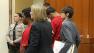 Three accused killers stood together, but silent, in a San Jose courtroom Friday.
