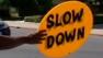 Slow down sign