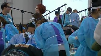 Hundreds of people lined up overnight at the San Jose Convention Center to take advantage of free dental services on Saturday.