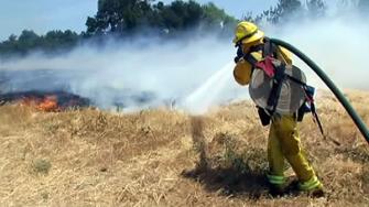 San Jose firefighter battles two-alarm grass fire